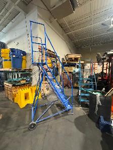 Used 8 step rolling ladder for sale.