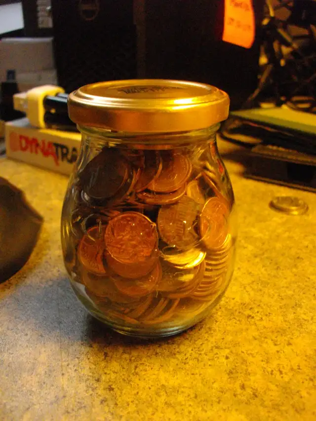 JAR OF 300 PENNIES FOUND IN LOCKER