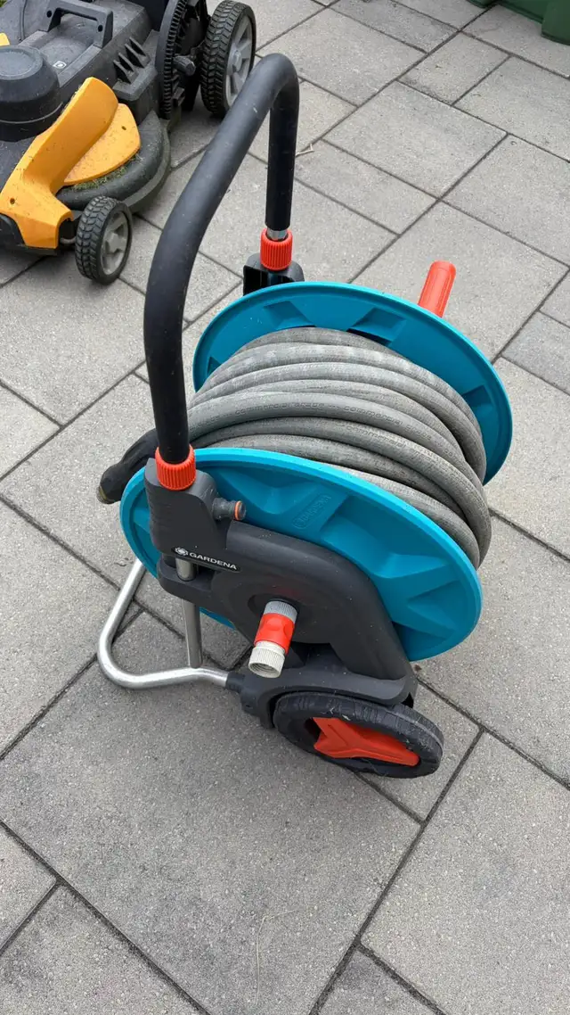 Portable garden hose reel with 100 feet heavy duty garden hose