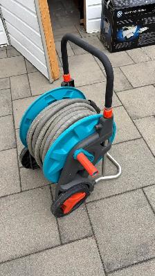 Portable garden hose reel with 100 feet heavy duty garden hose - Photo 2