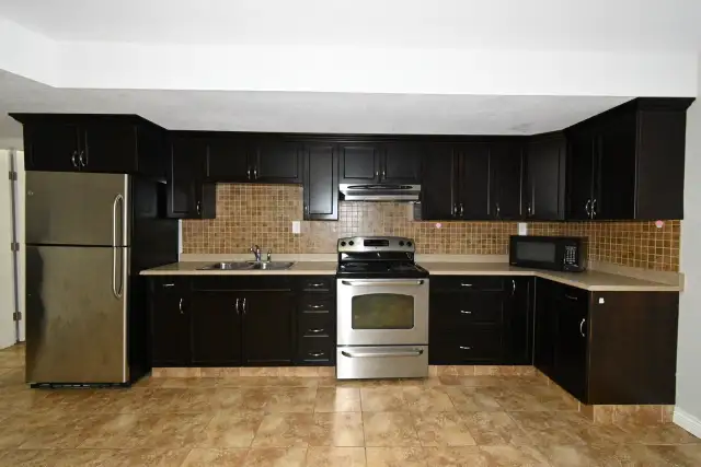 1-Bedroom   2-Dens 1-Bathroom l 7650D Grayshell Rd. l Basement S