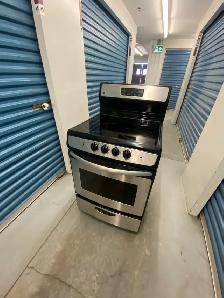 GE STAINLESS STEEL ELECTRIC STOVE - Photo 2