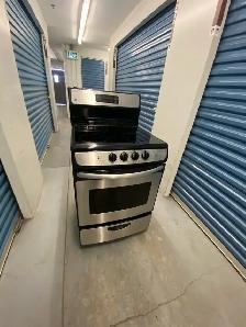 GE STAINLESS STEEL ELECTRIC STOVE - Photo 3
