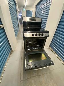 GE STAINLESS STEEL ELECTRIC STOVE - Photo 5