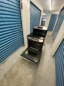 GE STAINLESS STEEL ELECTRIC STOVE - Photo 10
