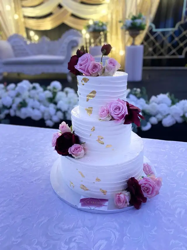 Milton wedding cakes , white floral cake, pink florals