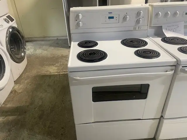 Cuisinière blanche ronds serpentins Inglis