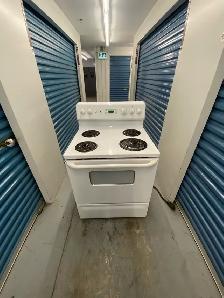 GE WHITE ELECTRIC STOVE