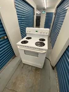 GE WHITE ELECTRIC STOVE - Photo 2