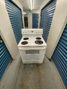 GE WHITE ELECTRIC STOVE