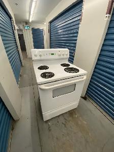 GE WHITE ELECTRIC STOVE - Photo 3
