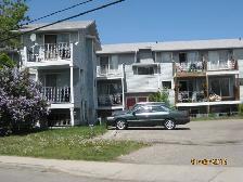 Townhouse style 1BR suite -  5 min to Cda Olympic Park (Bowness)