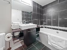 Modern and Spacious 2 Bedroom plus Den Condo Suite - Photo 7