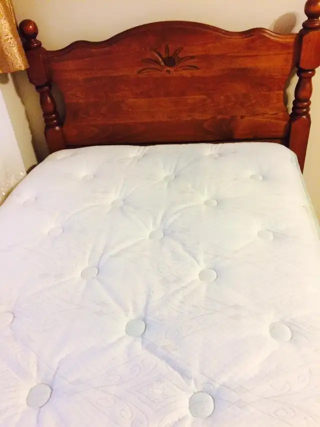 Double wooden bed and mattress for sale