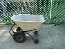 Contractors style wheelbarrow,, dual wheels, rear wheels, used