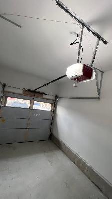 garage doors and opener - Photo 5
