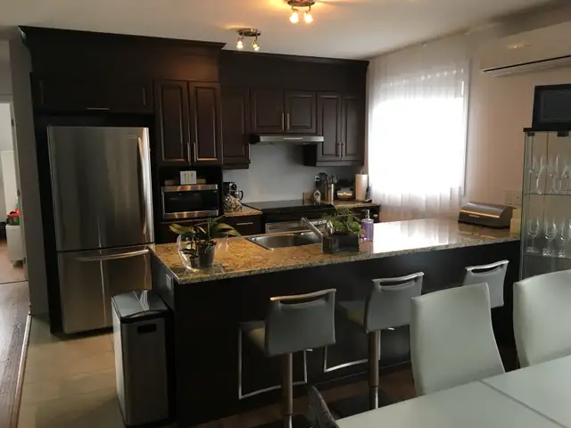 4 1/2 À LAVAL TRÈS TRANQUILLE AVEC ASCENSEUR!