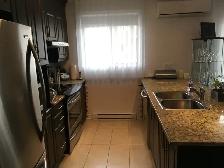 4 1/2 À LAVAL TRÈS TRANQUILLE AVEC ASCENSEUR! - Photo 2
