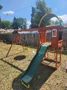 beautiful wooden swing set.
