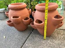 Two large strawberry clay pots for sale