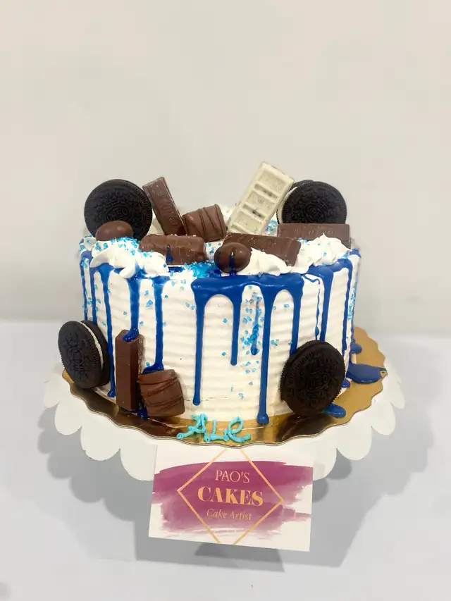 Blue drip cake, chocolate explition cake custom Cakes