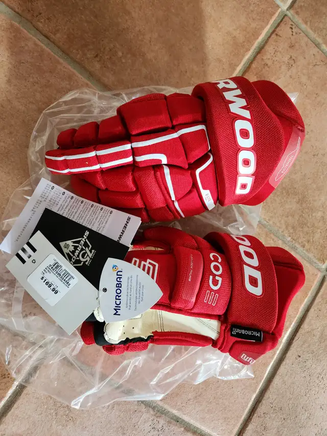 BRAND NEW SHERWOOD SR. HOCKEY GLOVES