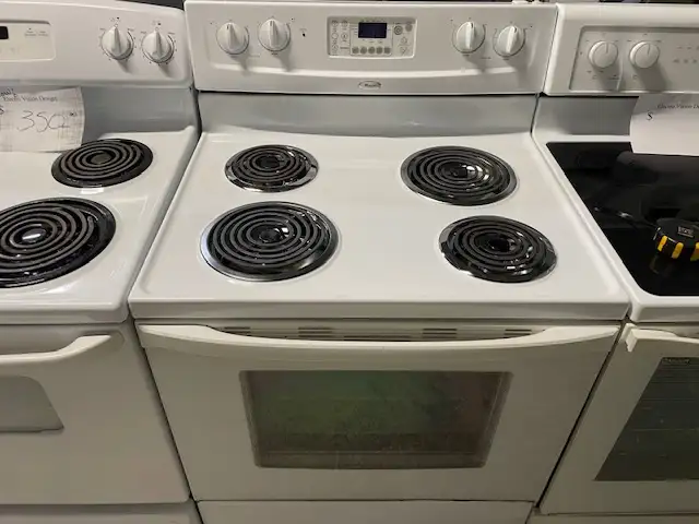 Cuisinière blanche ronds serpentins autonettoyante Whirlpool