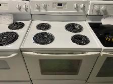 Cuisinière blanche ronds serpentins autonettoyante Whirlpool