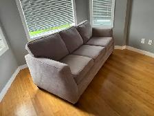 Grey sofa $200 .  No tears or cuts.
