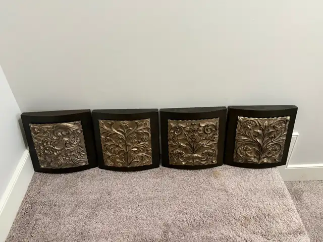 Four Gold on Black Carved Wall Plaques