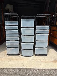 Three Plastic Shelving Units.