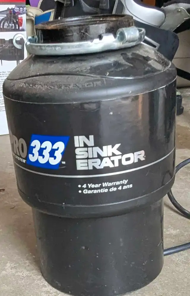 In Sink Erator Garburator