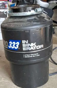 In Sink Erator Garburator