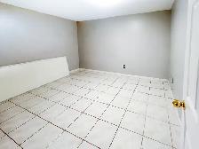 Spacious 2 Bed, 2 Bath Basement | Utilities & 2 Parking Included - Photo 3
