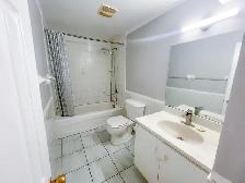 Spacious 2 Bed, 2 Bath Basement | Utilities & 2 Parking Included - Photo 4
