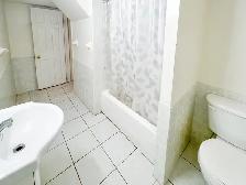 Spacious 2 Bed, 2 Bath Basement | Utilities & 2 Parking Included - Photo 5