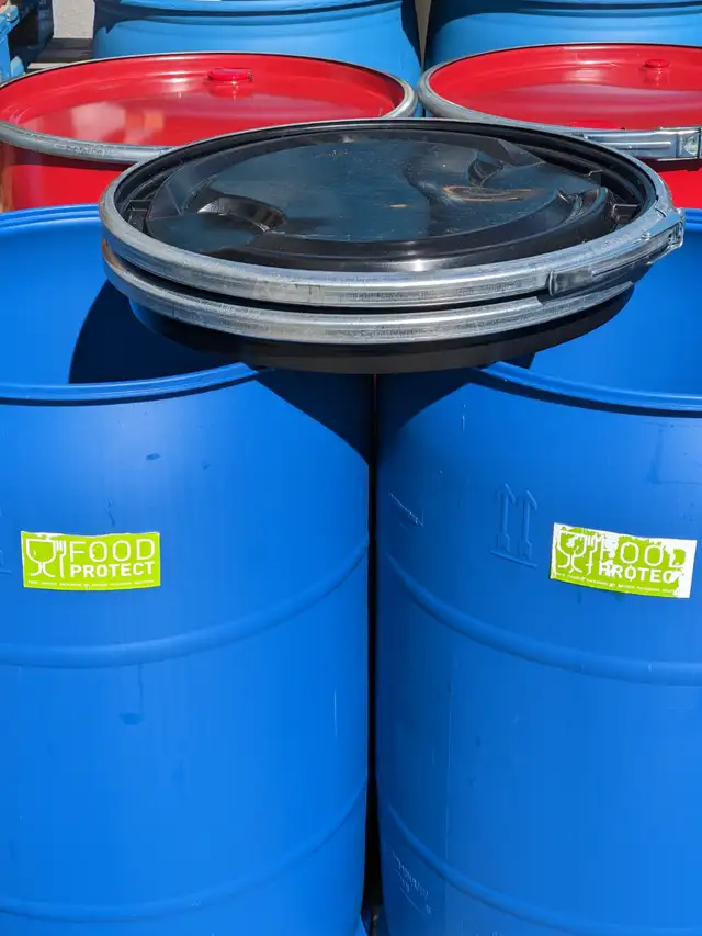 55 gallons plastic  food grade barrels.
