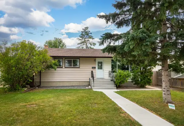 Beautifully Updated 4bdrm Bungalow located beside Miles Mac HS!