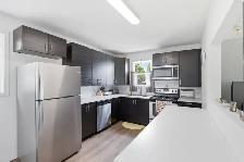 Beautifully Updated 4bdrm Bungalow located beside Miles Mac HS! - Photo 4