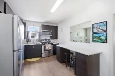 Beautifully Updated 4bdrm Bungalow located beside Miles Mac HS! - Photo 5
