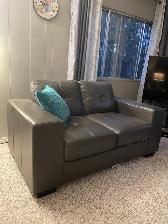Leather like loveseat  for sale