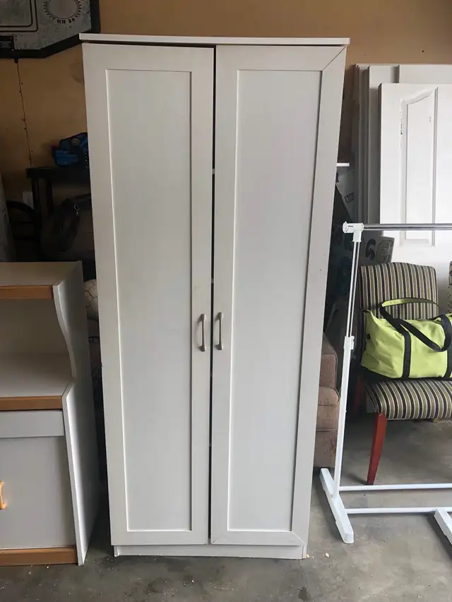 Tall White Storage Cabinet