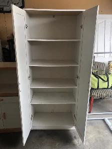 Tall White Storage Cabinet - Photo 2