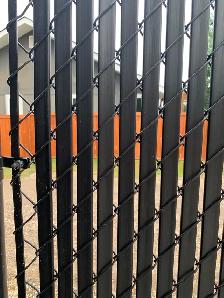 CHAIN LINK FENCE WITH PRIVACY SLATS - Photo 2