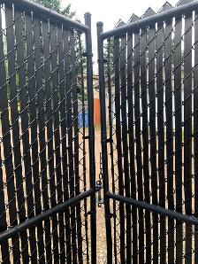 CHAIN LINK FENCE WITH PRIVACY SLATS - Photo 3