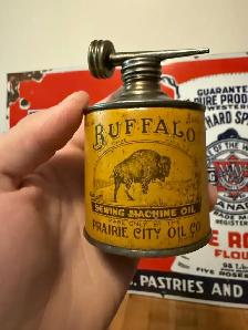 looking to buy old signs, gas pumps, oil cans
