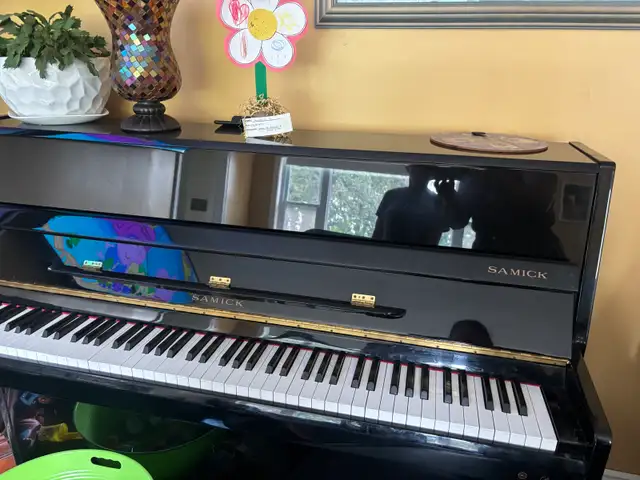Samick piano black tuned last year