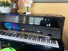 Samick piano black tuned last year