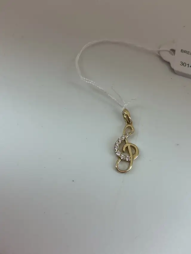 breloque en or 14k clef de sol