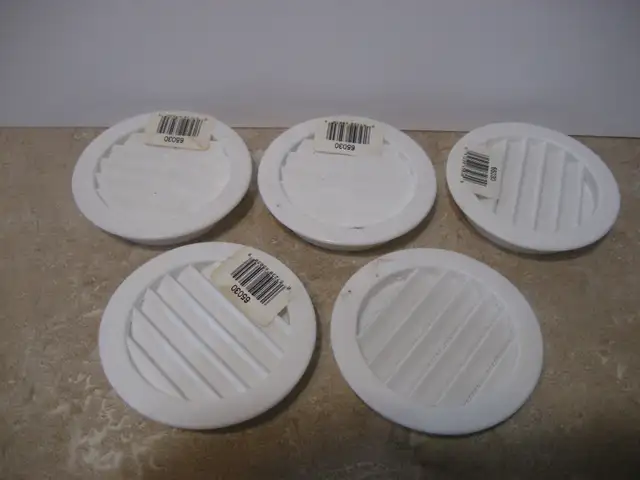 5 small round plastic vents